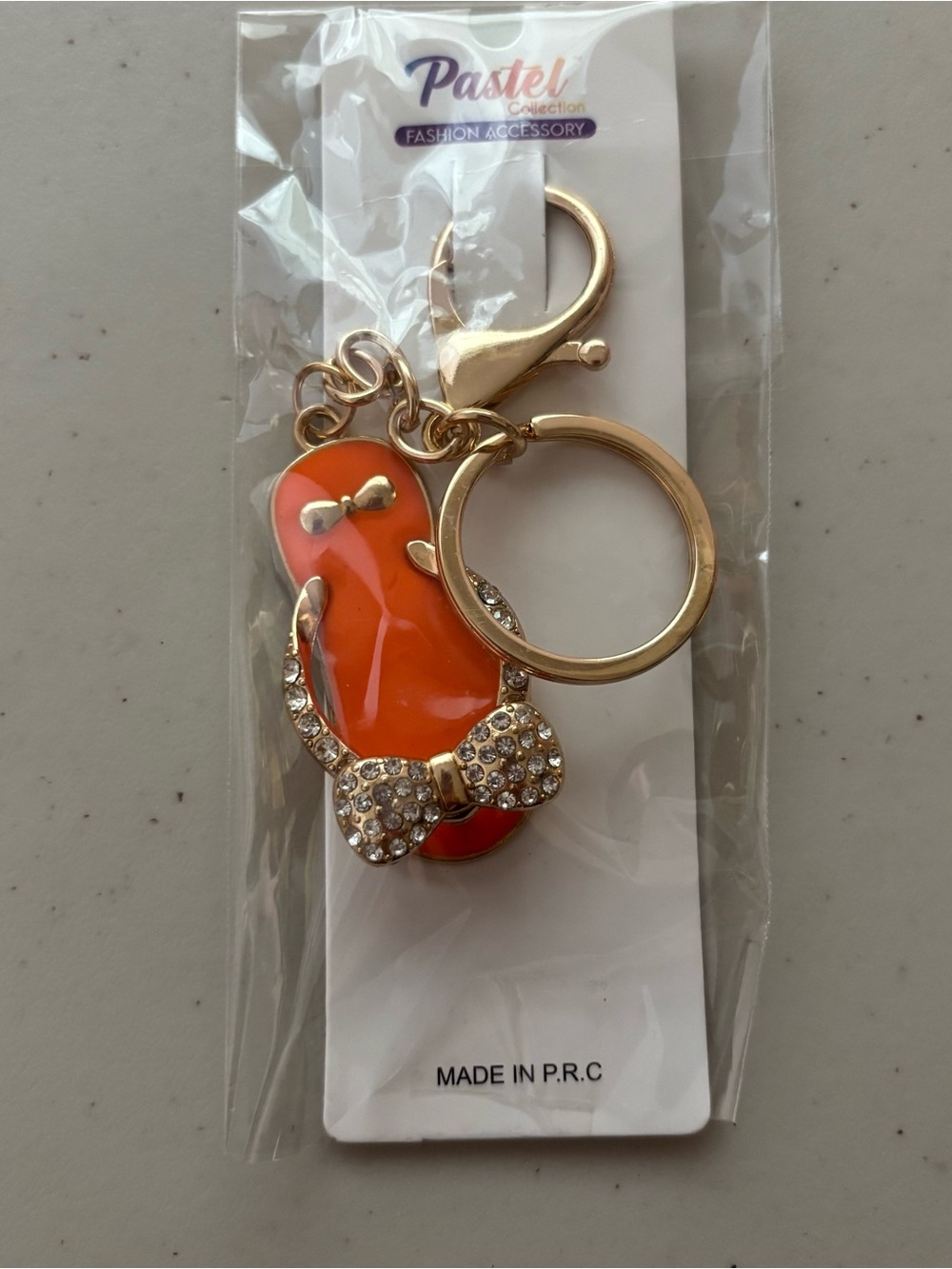 Sandle purse charm. New